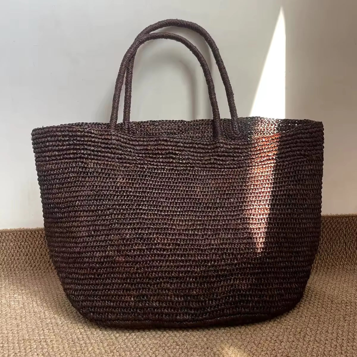 Vivienne borsa a mano in rattan intrecciato
