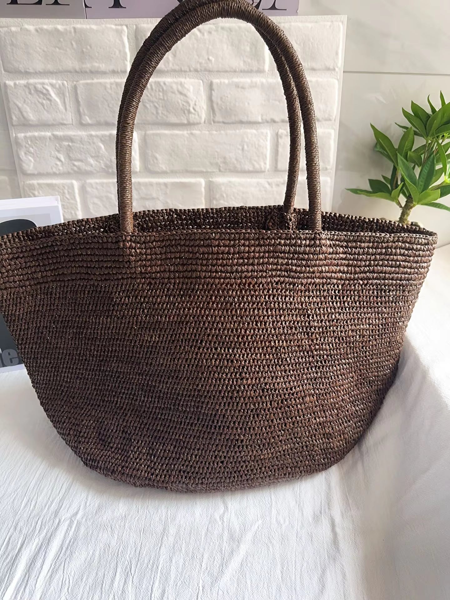 Vivienne borsa a mano in rattan intrecciato