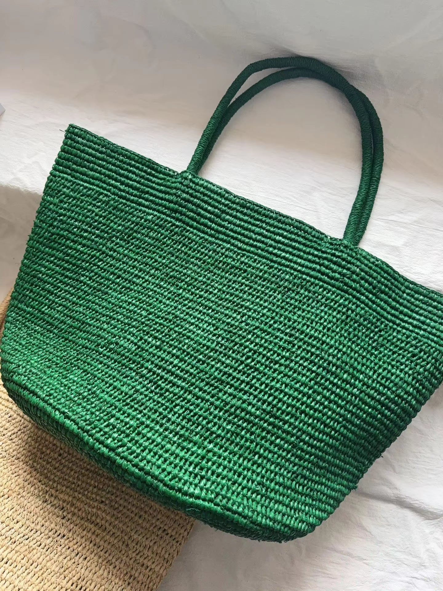 Vivienne borsa a mano in rattan intrecciato