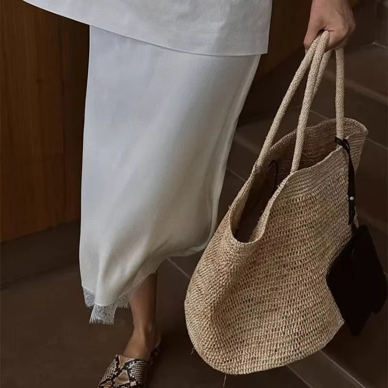 Vivienne borsa a mano in rattan intrecciato