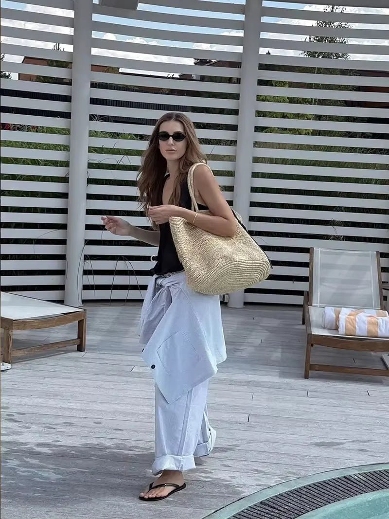 Vivienne borsa a mano in rattan intrecciato