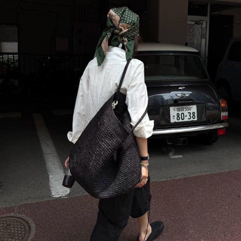 Vivienne borsa a mano in rattan intrecciato