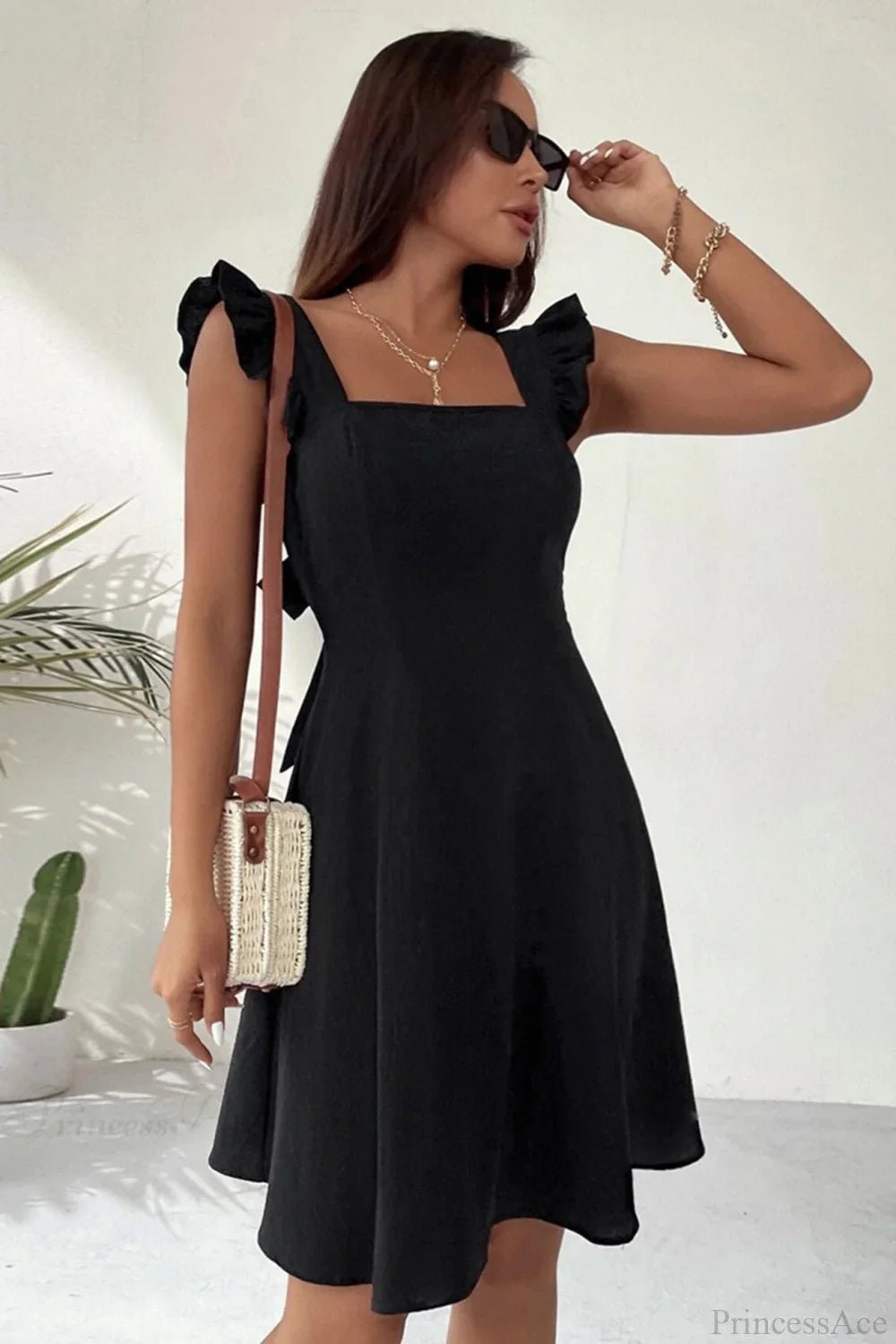 Mary Mini‑Kleid mit Rüschen und Bindeband am Rücken