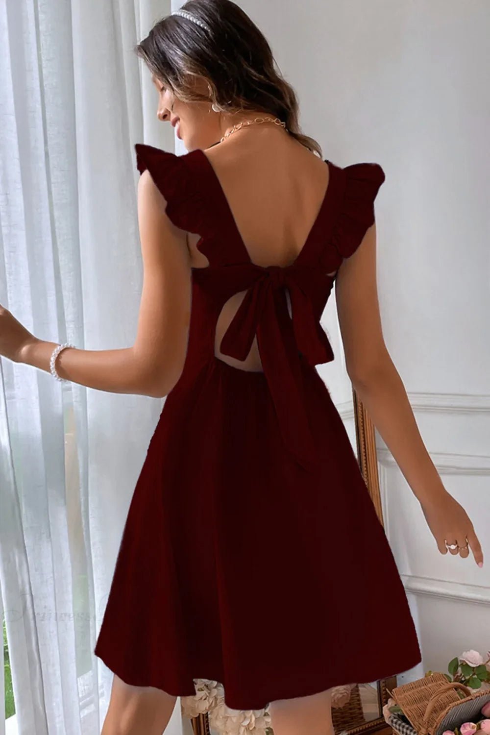 Mary Mini‑Kleid mit Rüschen und Bindeband am Rücken