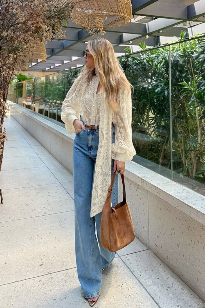Blusa Sandrine in pizzo trasparente con laccetto