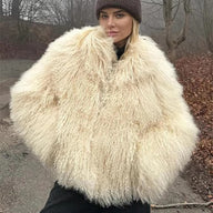 Manteau en fausse fourrure duveteuse Almira