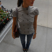 Blusa aderente a collo alto a quadri Lola