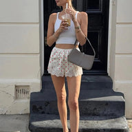 Agata gepunktete Shorts mit Spitzenbesatz